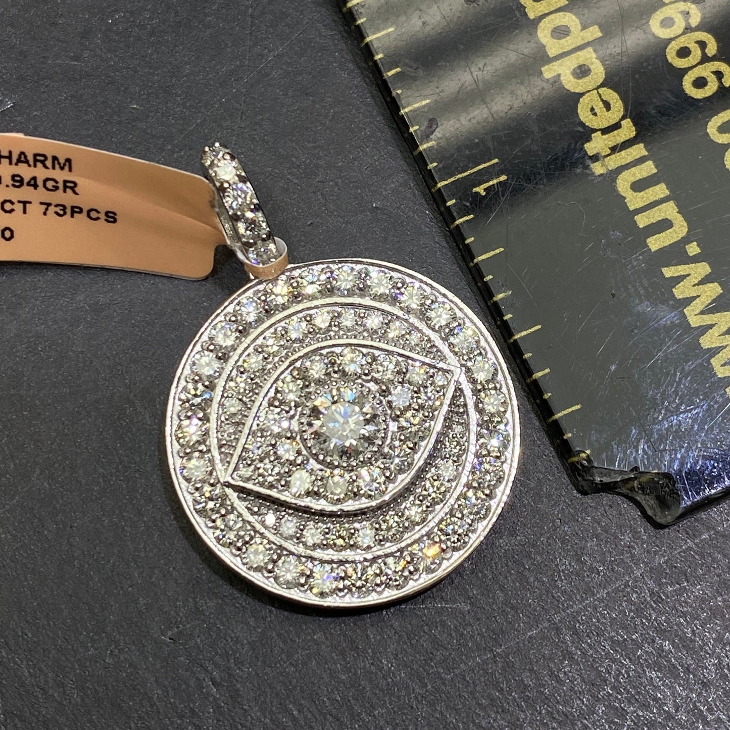 New14k “iced” 4cts Vs1 .50 carat center stone Eye pendant