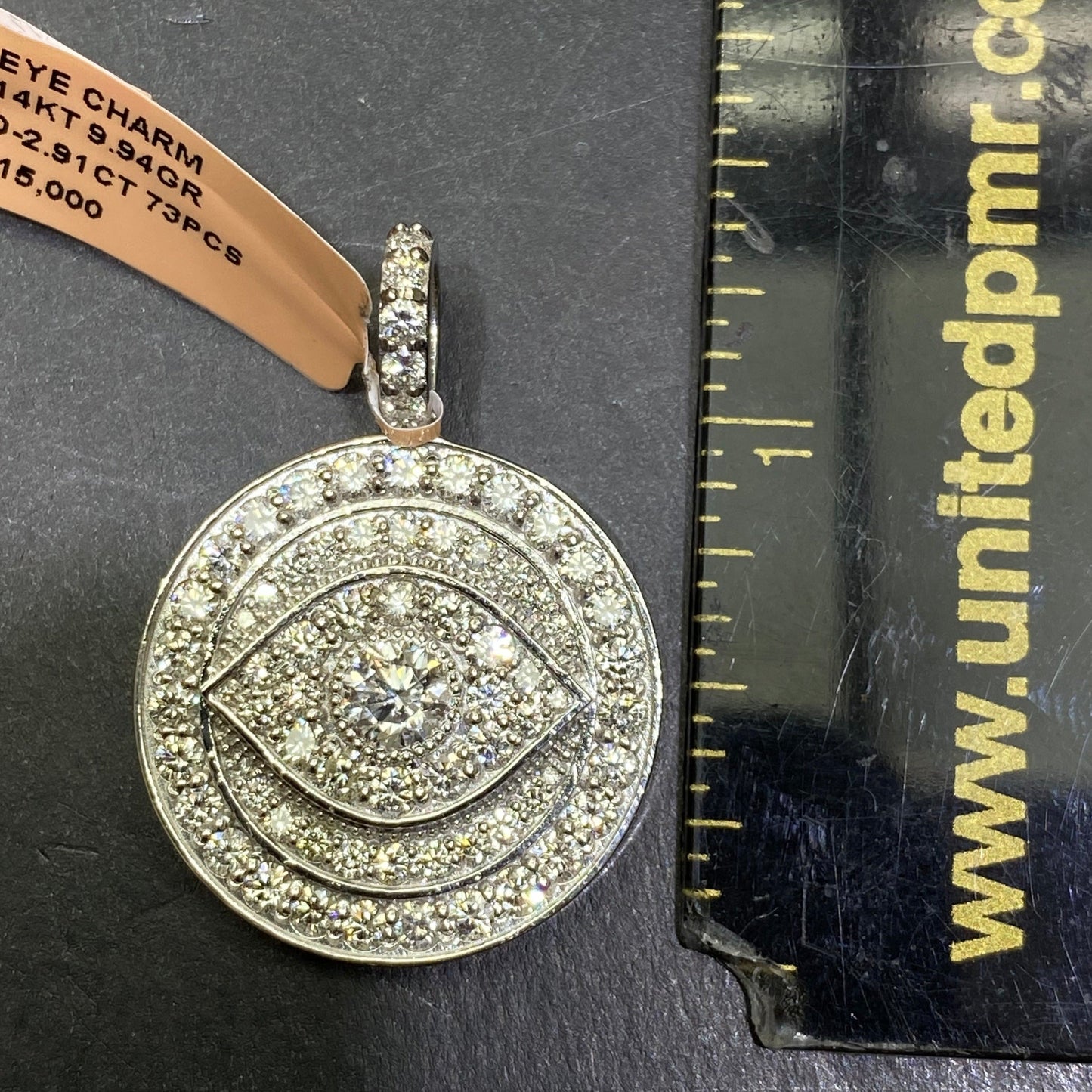 New14k “iced” 4cts Vs1 .50 carat center stone Eye pendant