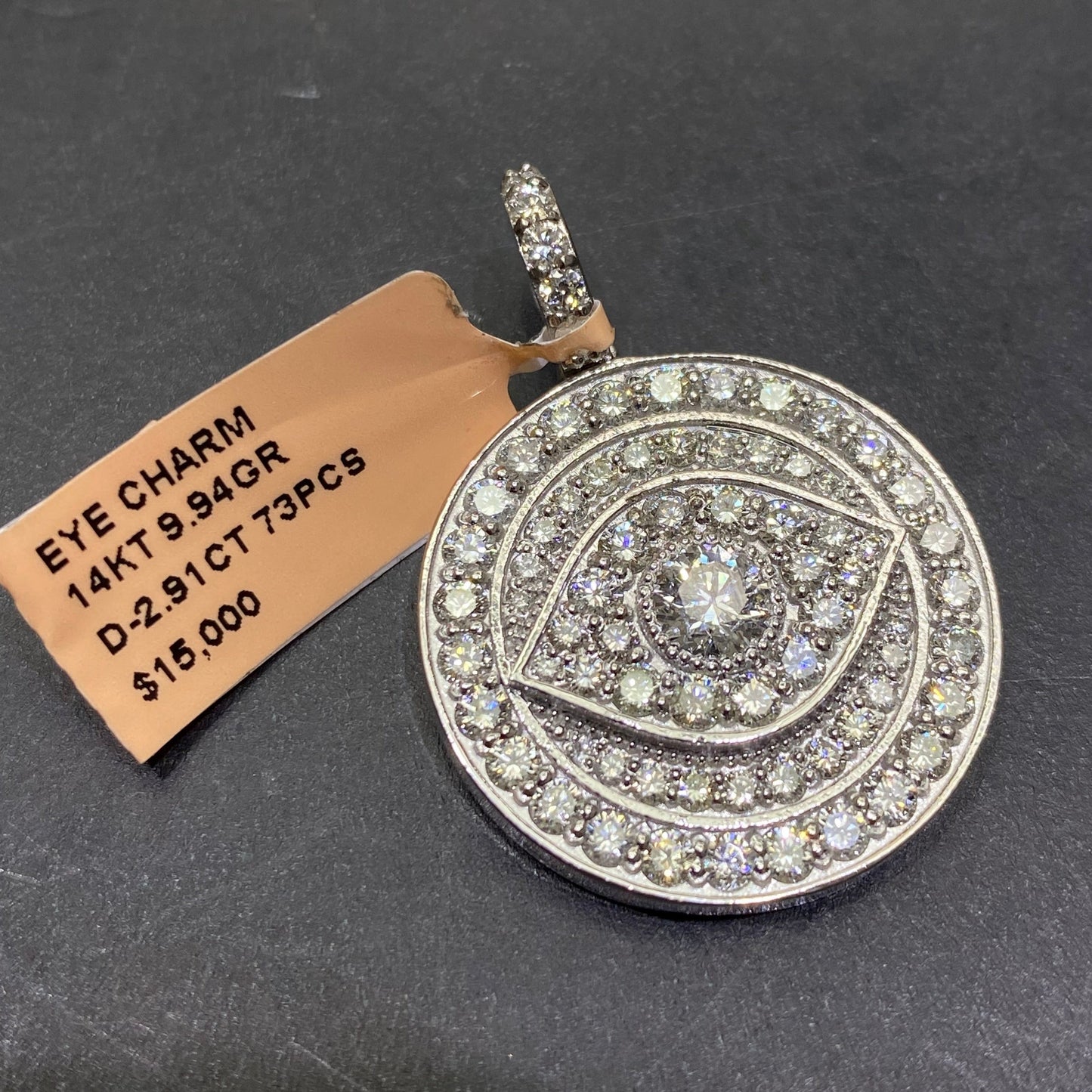 New14k “iced” 4cts Vs1 .50 carat center stone Eye pendant