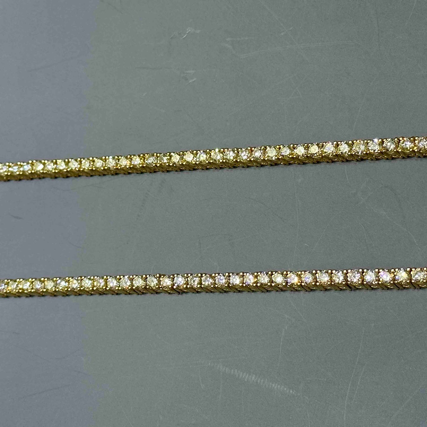 14k VS-1 Tennis Chain 25 CTs F-Color .20 Pointers